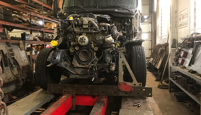 Shown:  Heavy duty truck having a frame repair completed.
