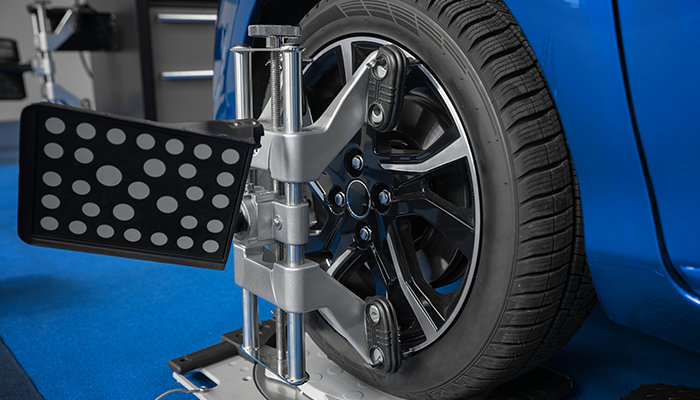 Photo showing 4-wheel alignment being performed at Dias Spring Service in Erie, PA.