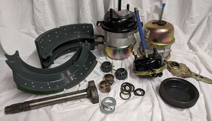 Image showing brake shoes, slacks, chambers and cam shafts for HD trucks available at Dias Spring Service.