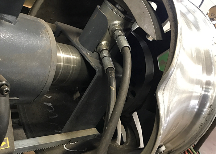 Dias Spring Service in Erie PA is using the Nirtomac rim straightening machine to repair a damaged bent wheel rim.