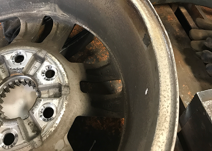 The damage to this wheel rim has been completely repaired.